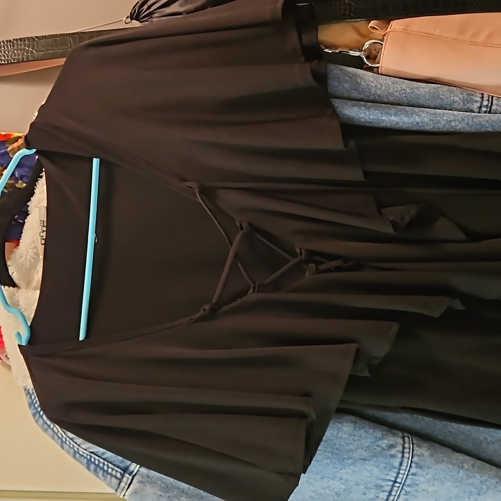Black ruffle front tie body suit